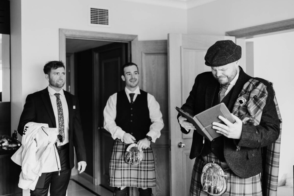 groomsmen getting ready at the chelsea harbour hotel