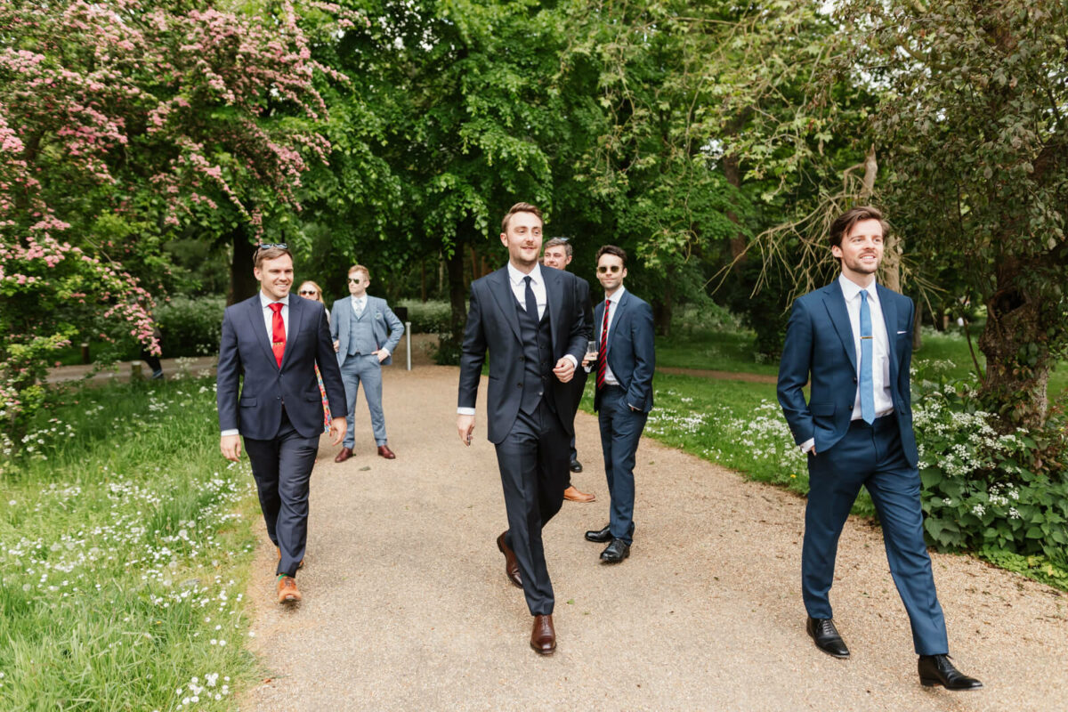 groomsmen walking to ceremony