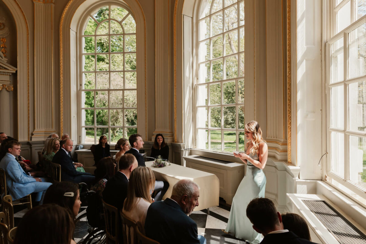guests laughing at Orleans house gallery wedding Twickenham