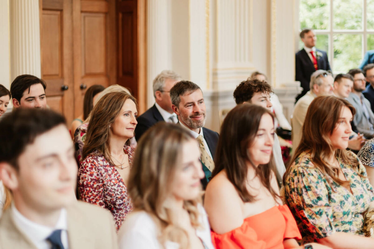 guests smiling at Orleans house gallery wedding Twickenham