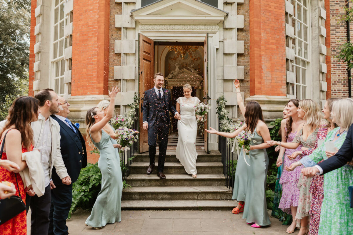 bride and groom in confetti at Orleans house gallery Twickenham