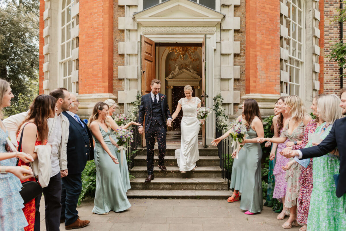 bride and groom in confetti at Orleans house gallery Twickenham
