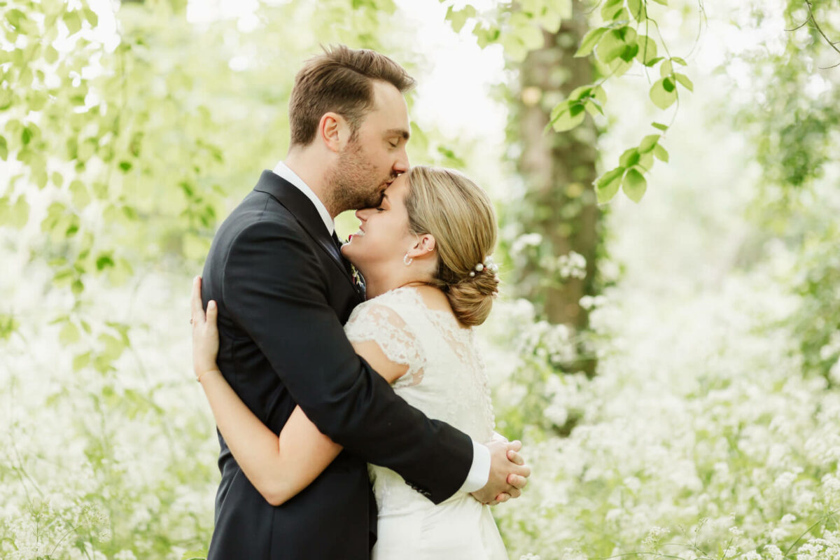 bride and groom laughing at Orleans house gallery wedding Twickenham
