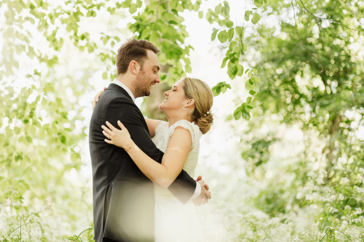 bride and groom laughing at Orleans house gallery wedding Twickenham