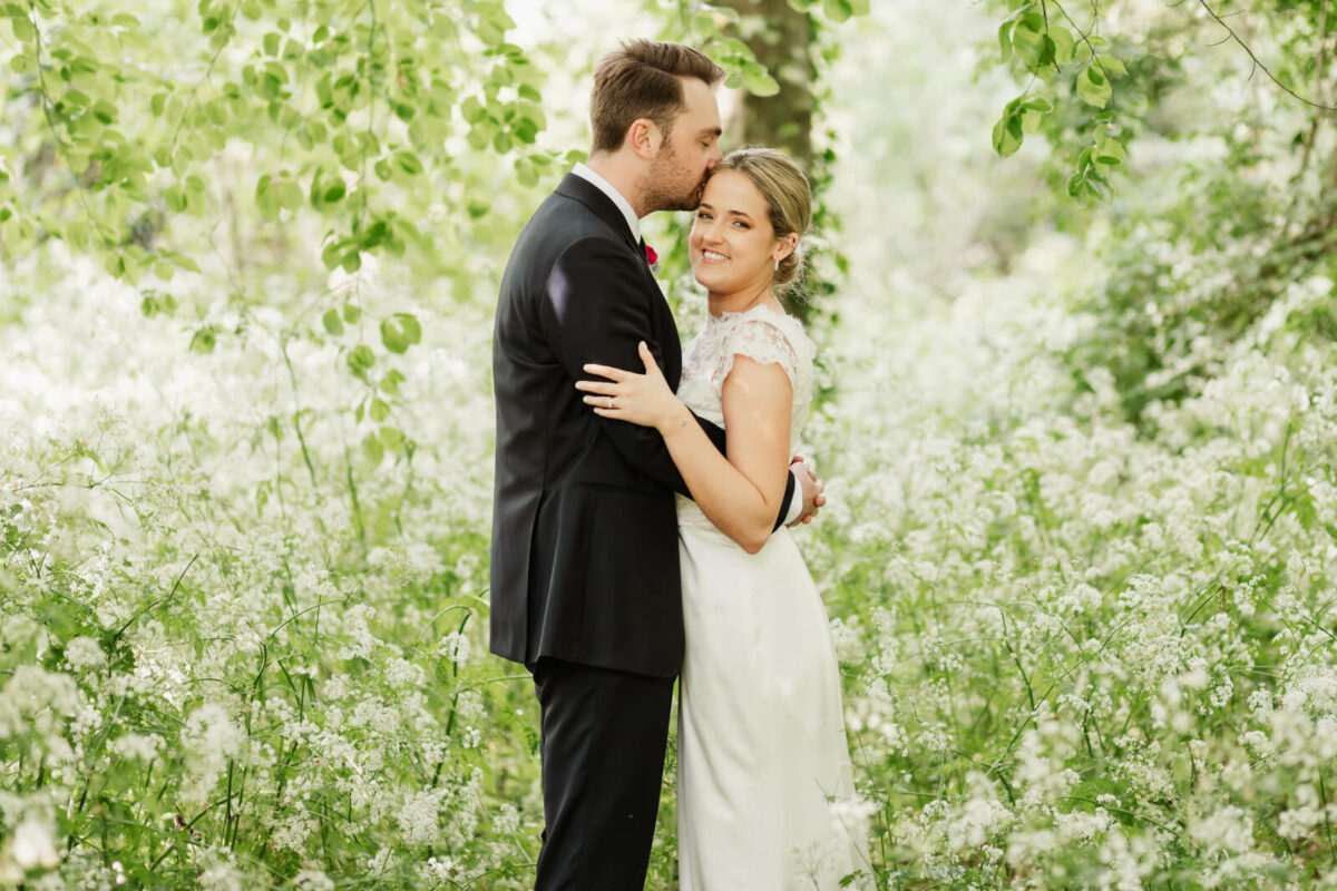 bride and groom laughing at Orleans house gallery wedding Twickenham