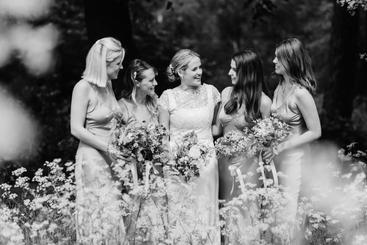 bride and bridesmaids laughing at Orleans house gallery wedding Twickenham