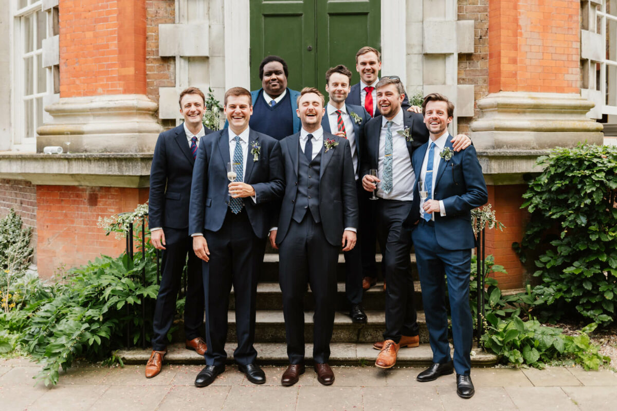 groomsmen laughing at Orleans house gallery wedding Twickenham