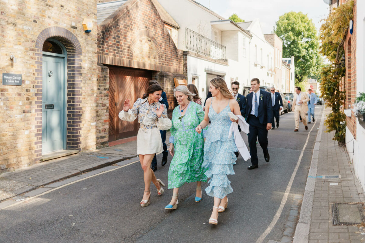 Orleans gallery wedding guests walking along country lane