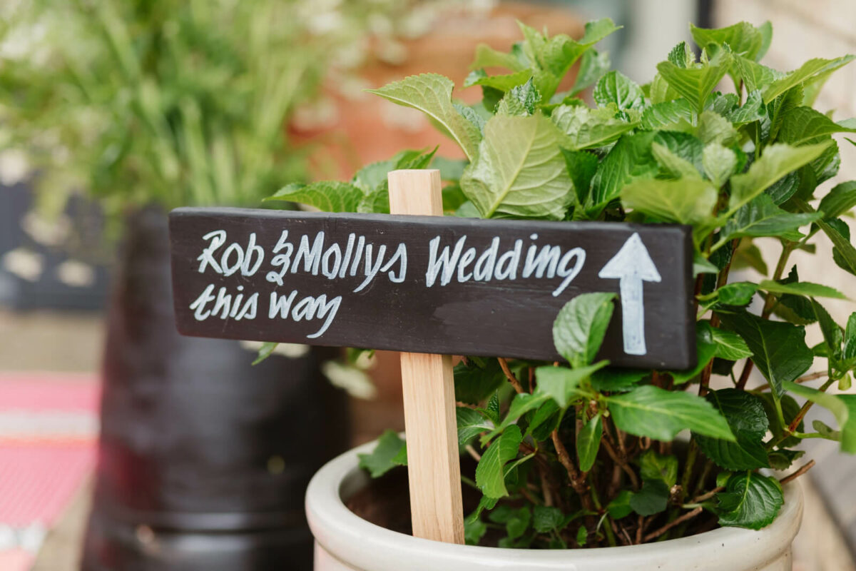 signs at Twickenham garden wedding