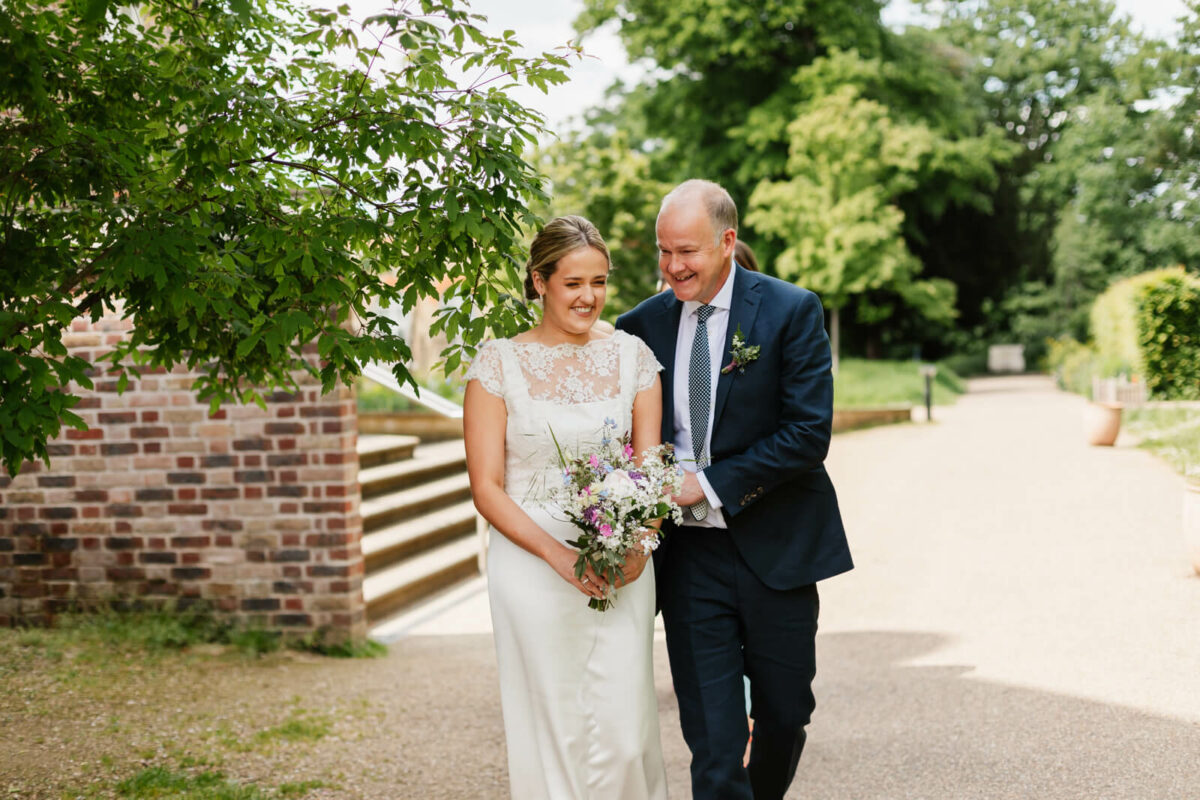 bride arriving with her dad at Orleans house gallery wedding Twickenham