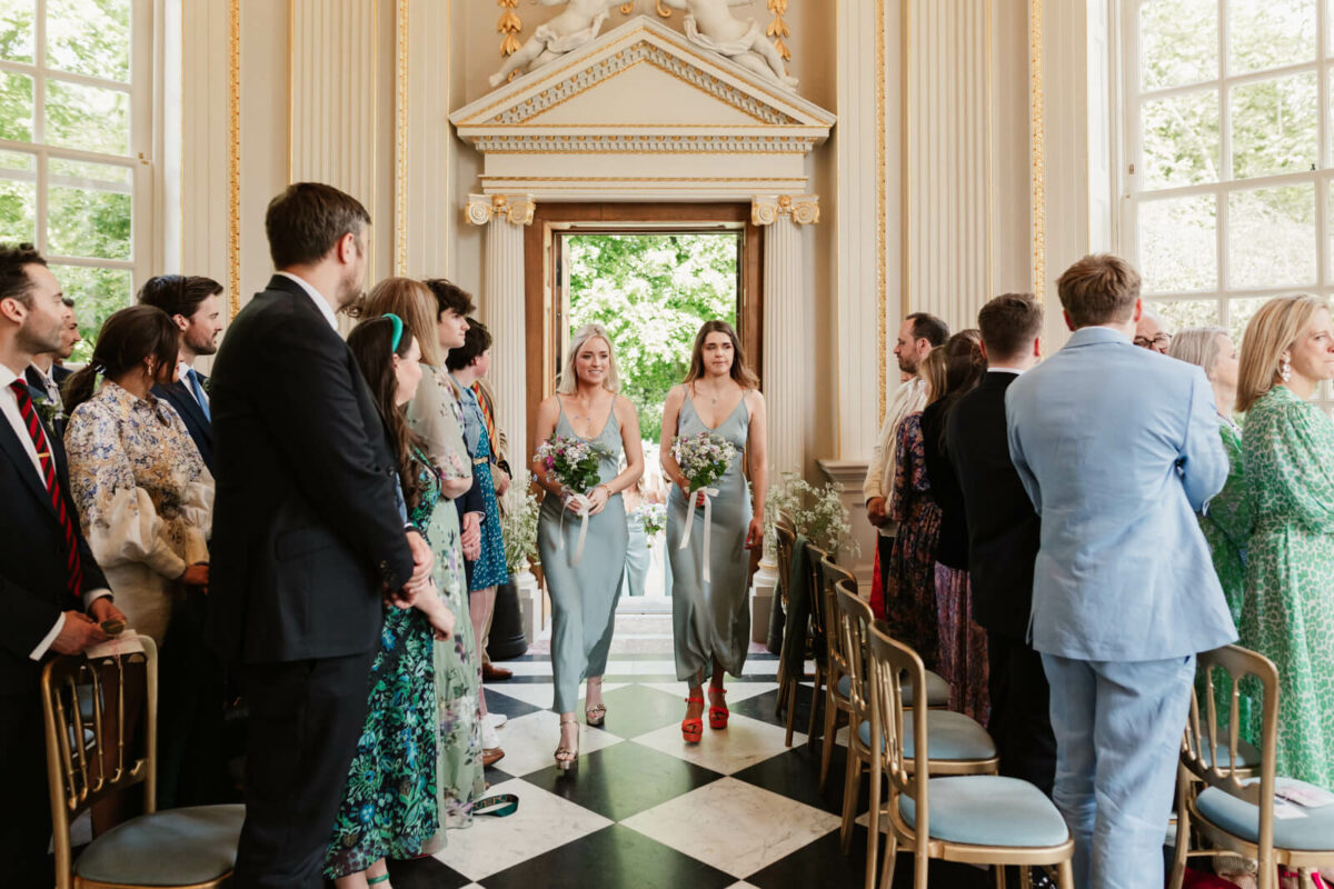 bridesmaids walk into orleans house gallery wedding