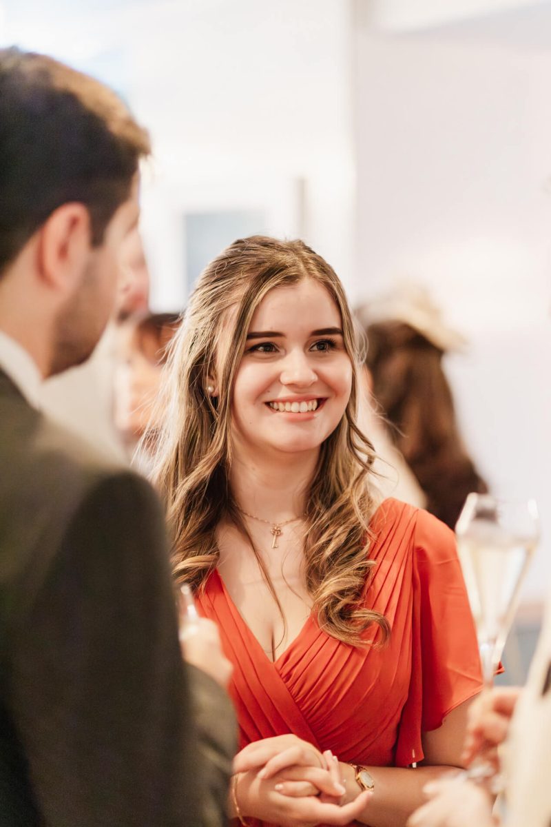 photograph of wedding guest smiling