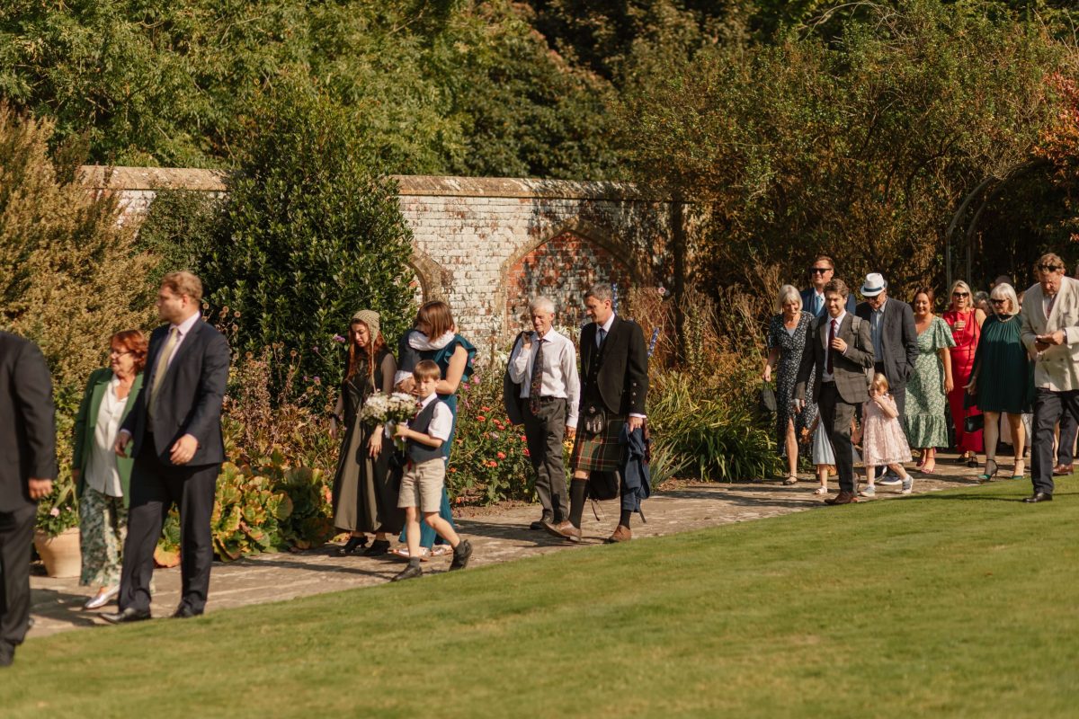 pictures of guests enjoying drinks reception at horsted place hotel
