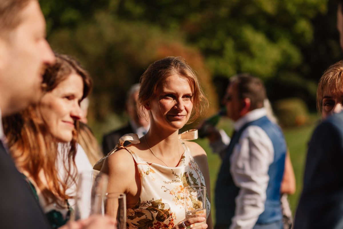 pictures of guests enjoying drinks reception at horsted place hotel