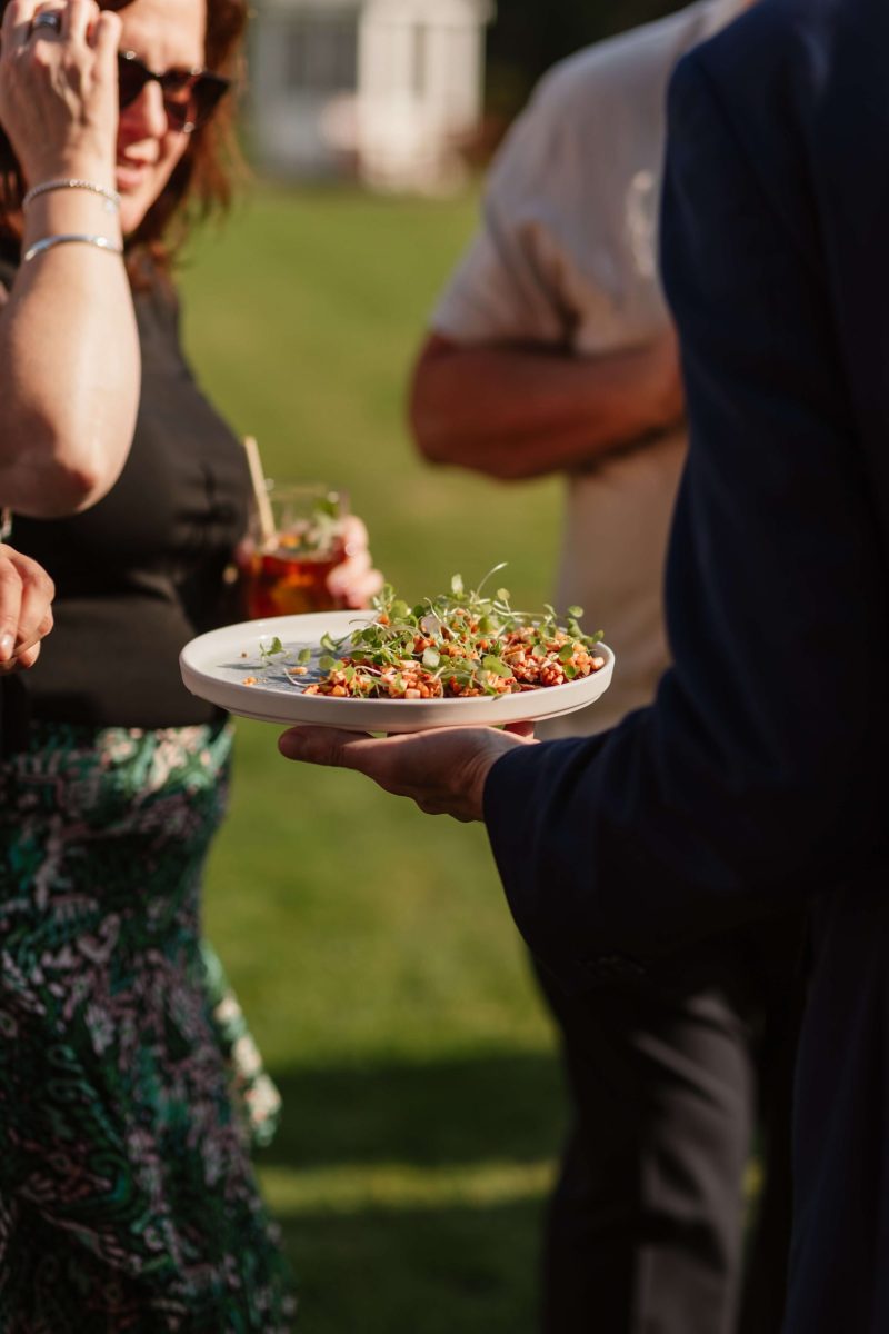 pictures of guests enjoying drinks reception at horsted place hotel