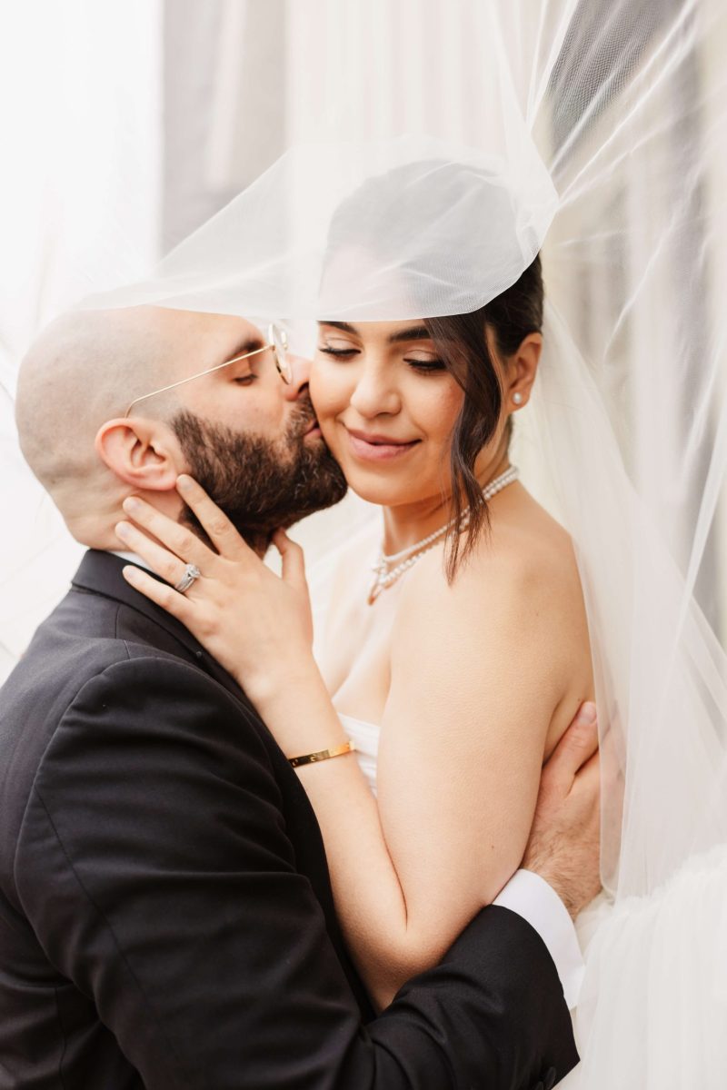 bride and groom kissing captured by west midlands wedding photographer