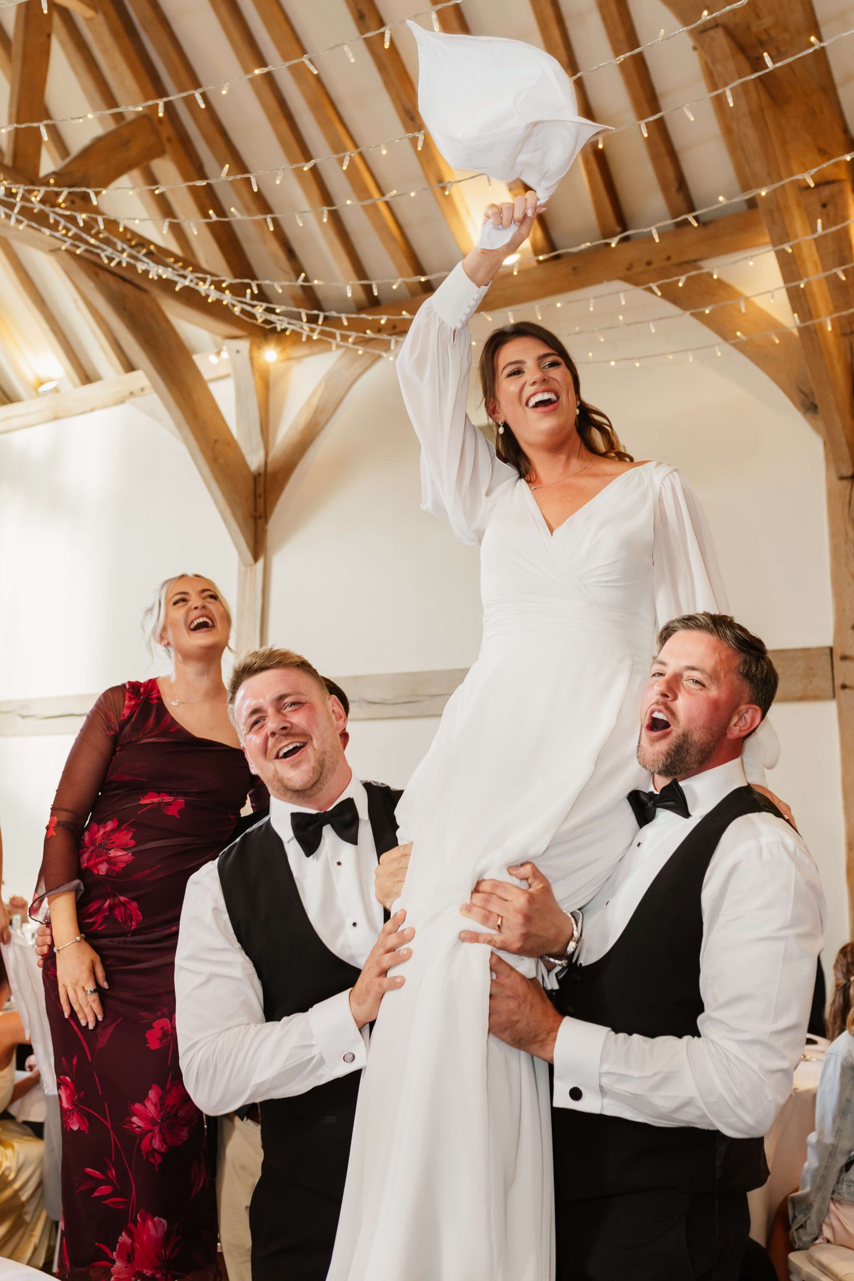 photograph of bride and groom laughing and dancing at cain manor wedding