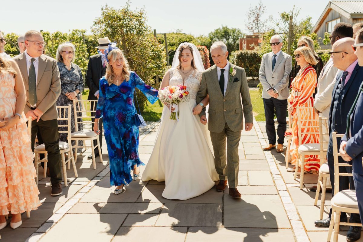 outdoor wedding ceremony at cider mill barn warwickshire wedding venue