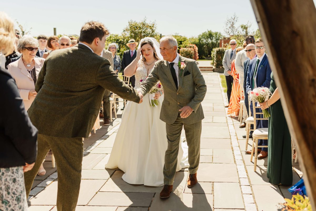 outdoor wedding ceremony at cider mill barn warwickshire wedding venue