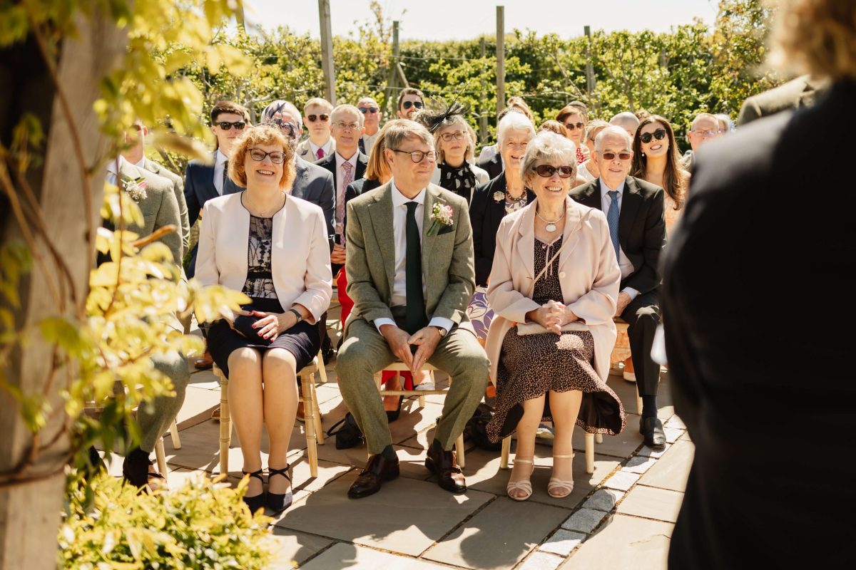 outdoor wedding ceremony at cider mill barn warwickshire wedding venue