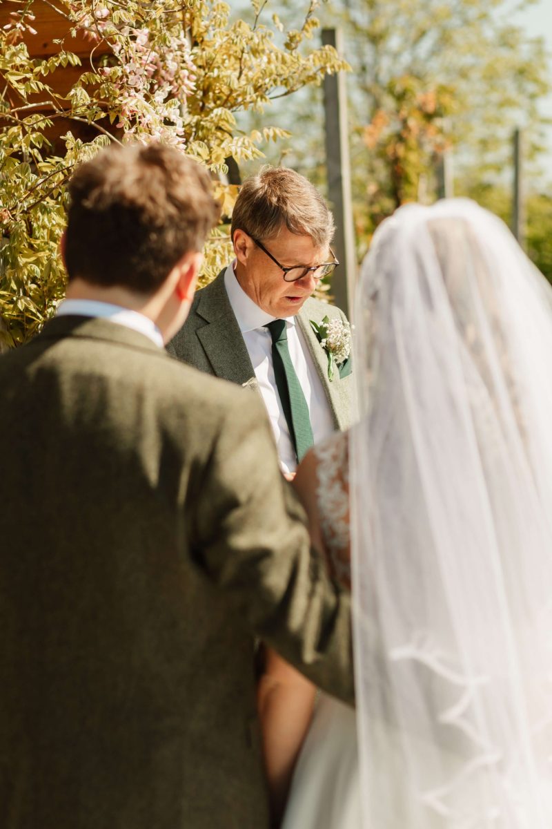 outdoor wedding ceremony at cider mill barn warwickshire wedding venue