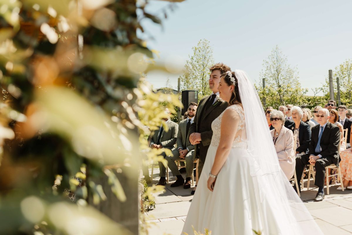 outdoor wedding ceremony at cider mill barn warwickshire wedding venue