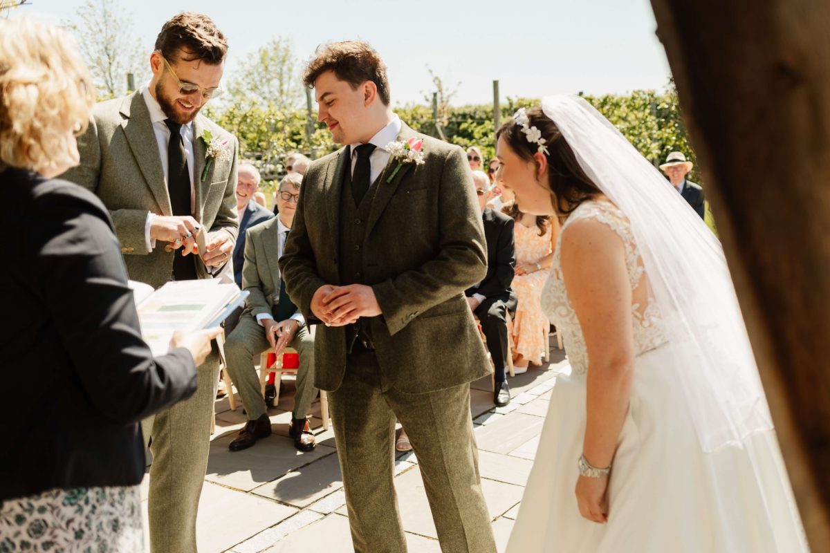 outdoor wedding ceremony at cider mill barn warwickshire wedding venue