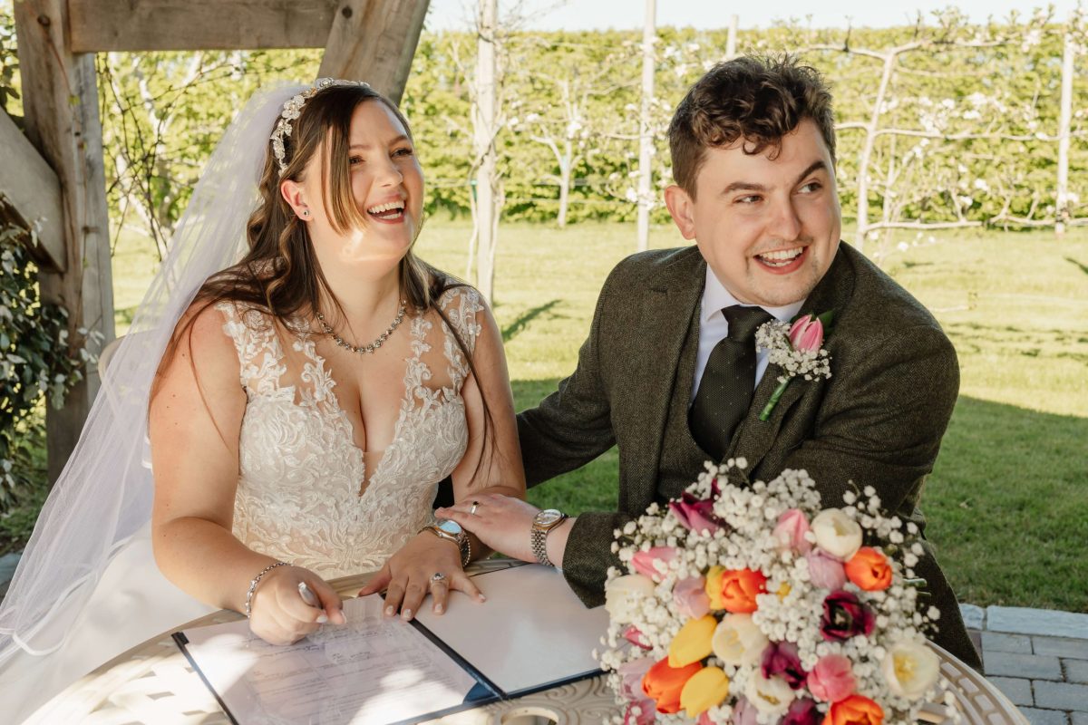 outdoor wedding ceremony at cider mill barn warwickshire wedding venue