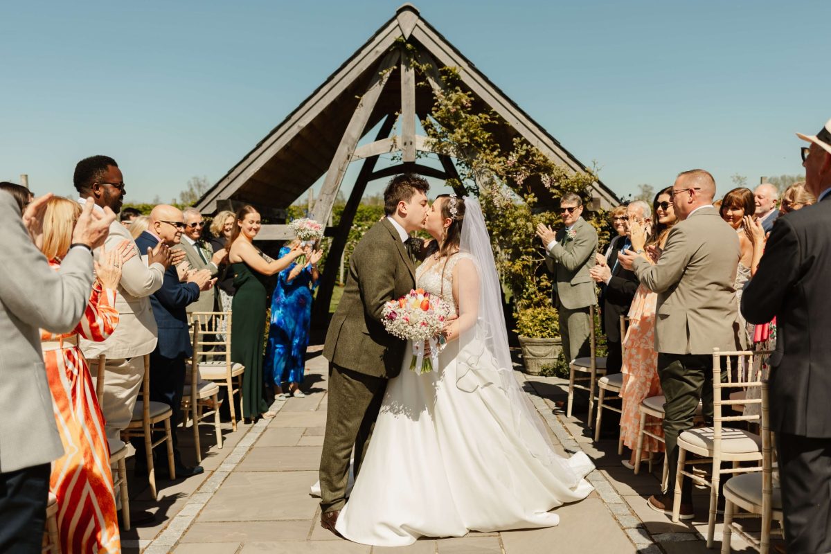 outdoor wedding ceremony at cider mill barn warwickshire wedding venue