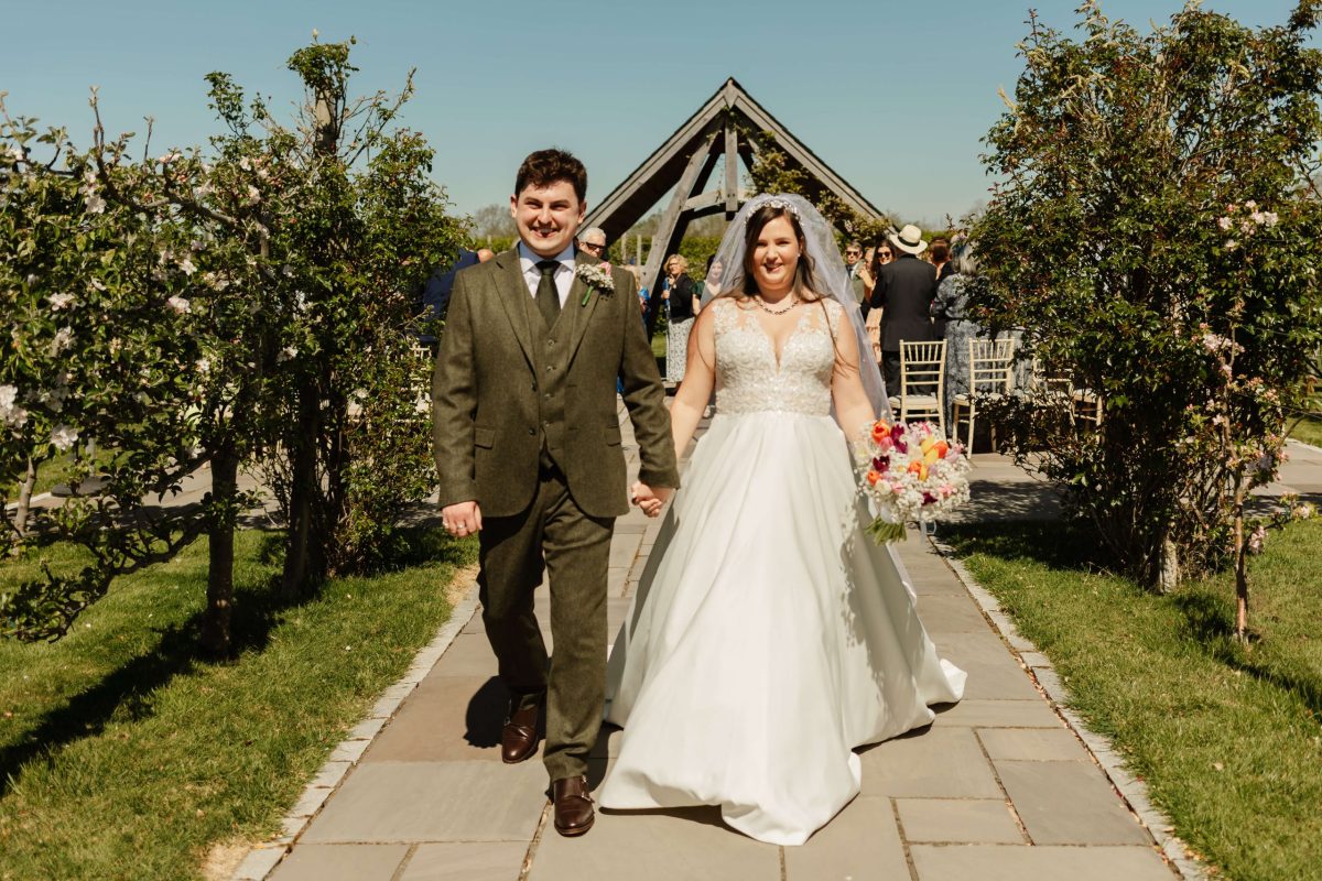 outdoor wedding ceremony at cider mill barn warwickshire wedding venue