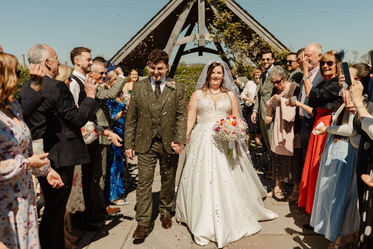 outdoor wedding ceremony at cider mill barn warwickshire wedding venue